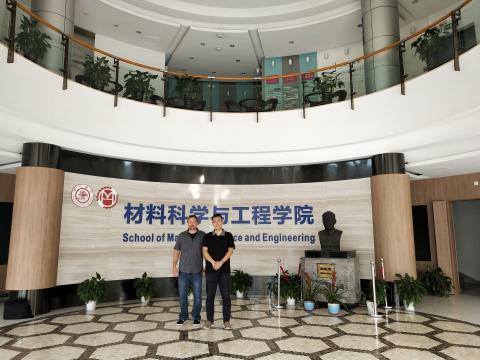 Brian Wardle (L) and Kehang Cui (R) in the lobby of Shanghai Jiao Tong University (SJTU) - Materials Science and Engineering (MSE)