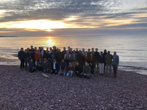 US-COMP attendees taking a break at the shore, Oct. 2019 (photo credit: Greg Odegard)