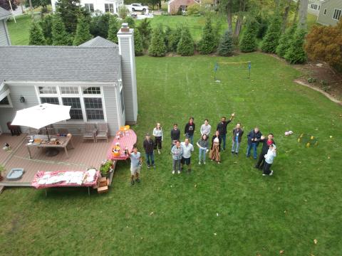 necstlab'ers at bbq, 2021-10, on a diagonal/wide-shot, smiling up at the camera